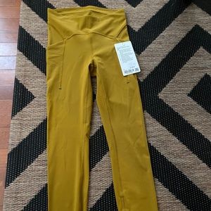 Lululemon Power Thru high rise tight.  New with tags, size 4